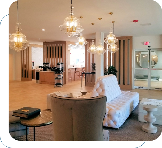 Warm lounge area with hanging glass chandeliers